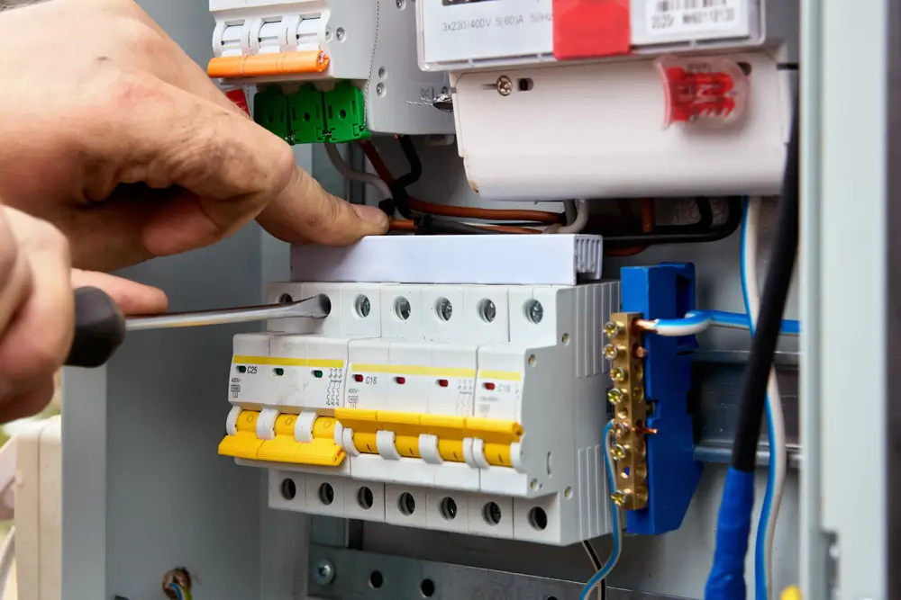 Electrician Kapiti identifying warning signs that signal the need for Switchboard Upgrades Kapiti to keep your property safe and compliant.