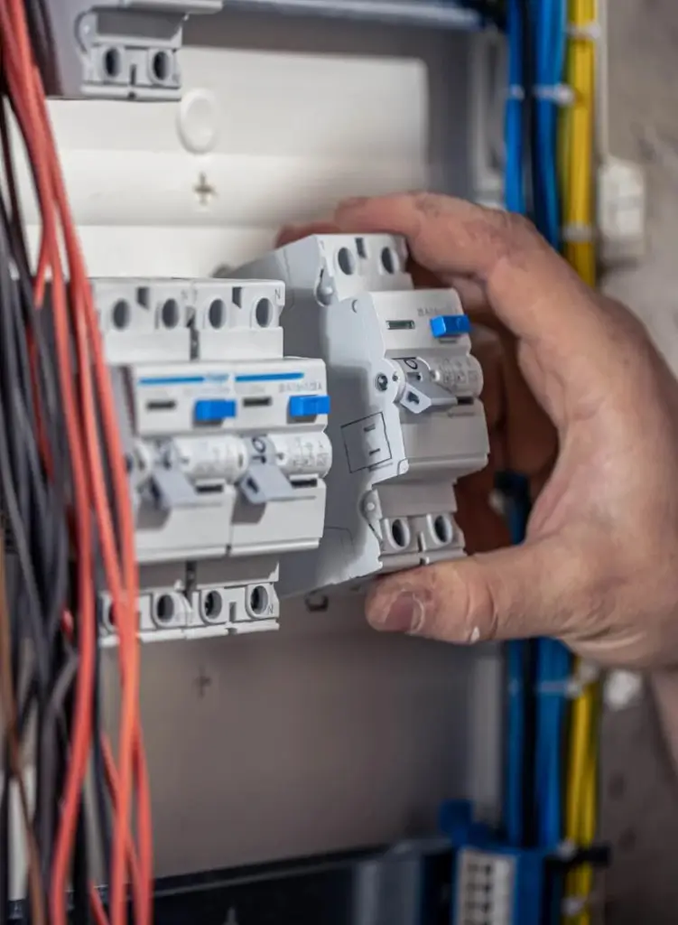 Electrician Kapiti team carrying out professional commercial Switchboard Upgrades Kapiti for enhanced safety and performance.